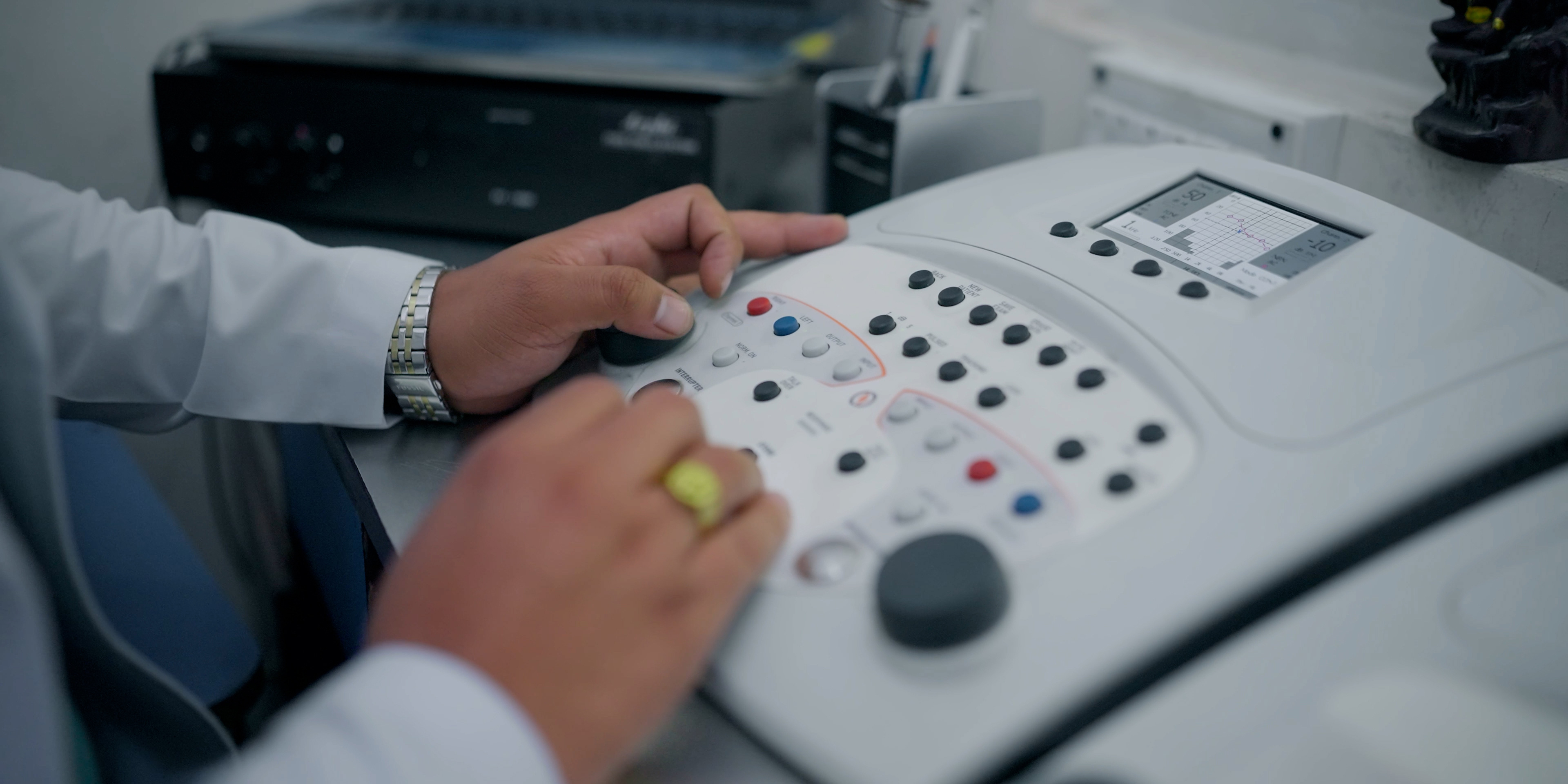 Audiologist consulting a patient