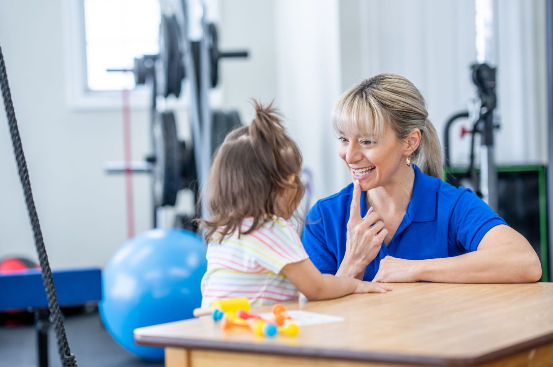 Audiologist consulting a patient